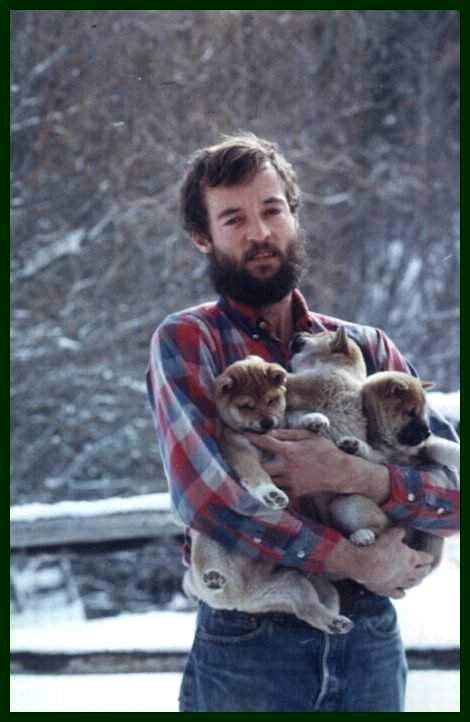 Chris with puppies
